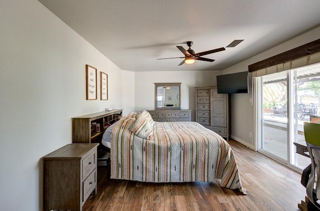 20794 E Weldon Ave, Sanger, CA 93657 - bedroom with access to exterior, wood finished floors, and a ceiling fan
