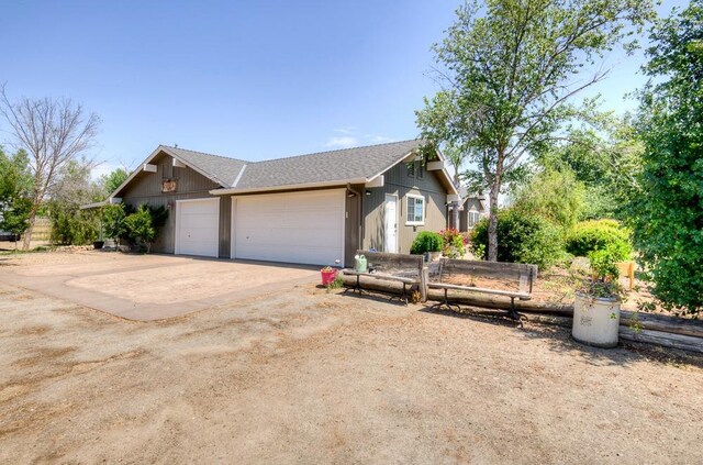 20794 E Weldon Ave, Sanger, CA 93657 - view of front of property with concrete driveway, a garage, and a shingled roof