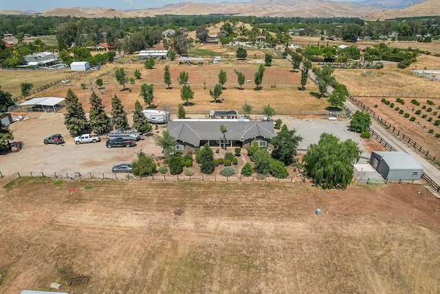 bird's eye view with a rural view and a mountain view