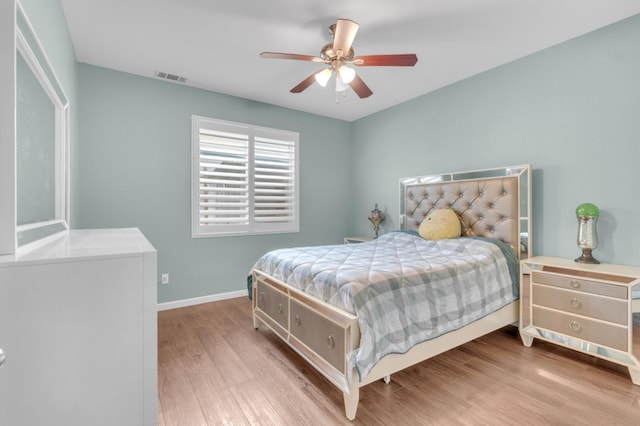 2776 Keats Ave, Clovis, CA 93611 - bedroom with a ceiling fan, visible vents, wood finished floors, and baseboards