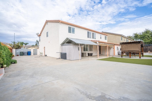 2776 Keats Ave, Clovis, CA 93611 - back of house with a patio, stucco siding, and fence
