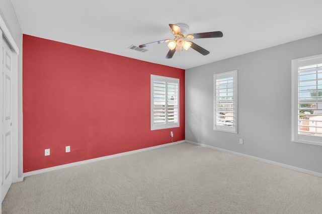 2776 Keats Ave, Clovis, CA 93611 - carpeted spare room with a ceiling fan, baseboards, and visible vents