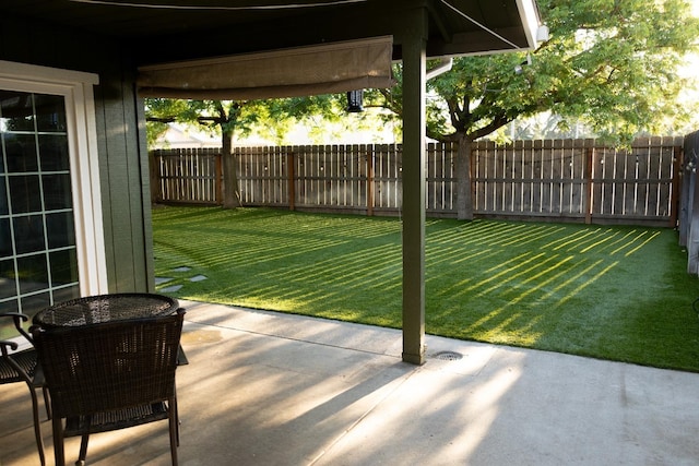 view of patio featuring a fenced backyard