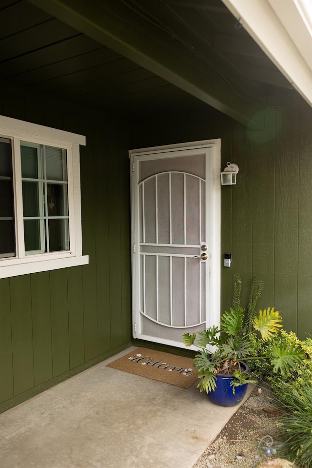 doorway to property with a porch