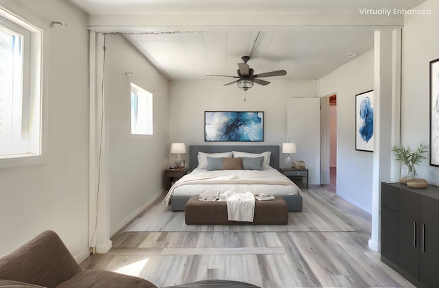 bedroom with baseboards, ceiling fan, and light wood-type flooring