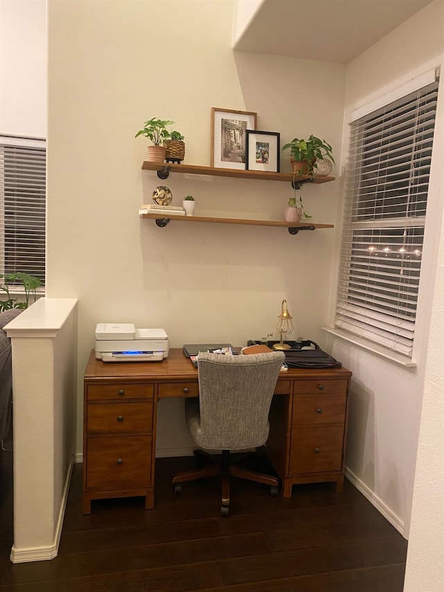 office space featuring baseboards and dark wood-style flooring