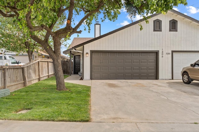 ranch-style house with a front lawn, concrete driveway, a chimney, and fence