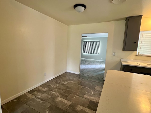 3330 Virginia St, Atwater, CA 95301 - unfurnished dining area featuring baseboards