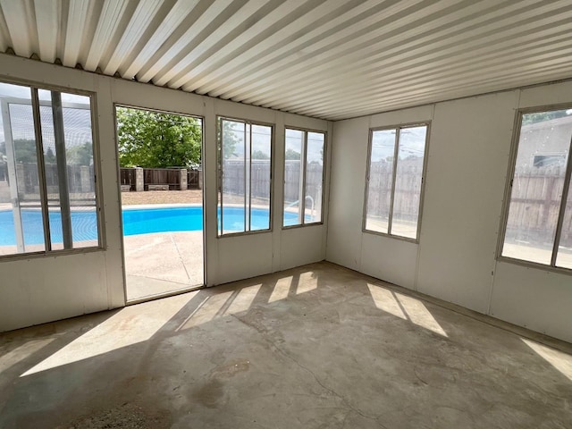 3330 Virginia St, Atwater, CA 95301 - unfurnished sunroom featuring unfinished concrete floors and a healthy amount of sunlight