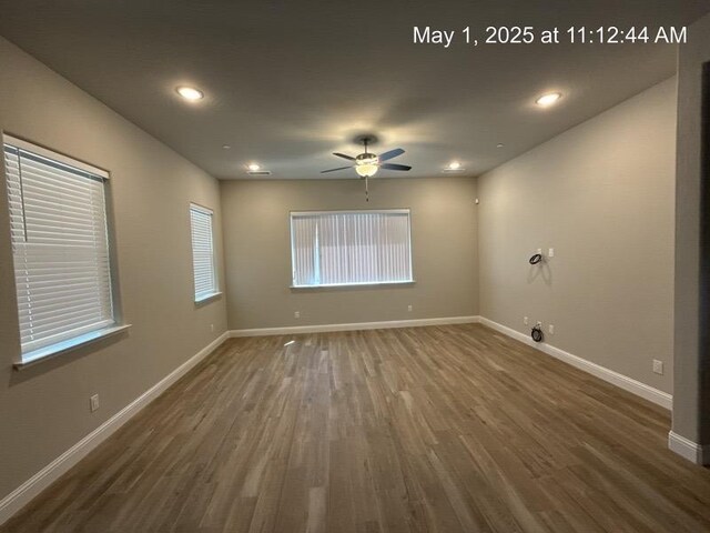 1765 N Whitmore, Clovis, CA 93619 - unfurnished room featuring baseboards, wood finished floors, a ceiling fan, and recessed lighting