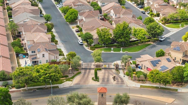 birds eye view of property with a residential view