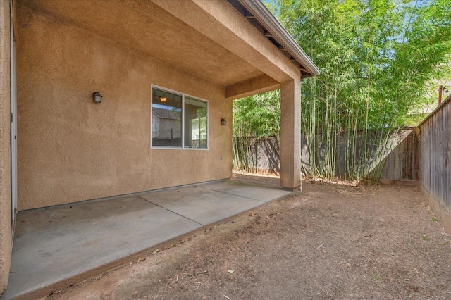 view of patio with a fenced backyard