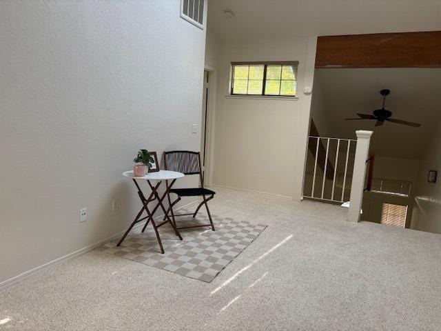 7093 N Teilman Unit 102, Fresno, CA 93711 - sitting room with ceiling fan, carpet, and an upstairs landing