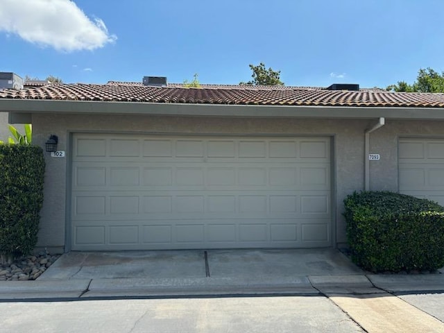 garage with driveway