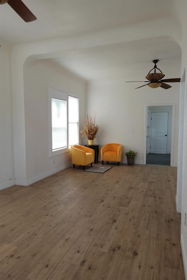 220 S K, Madera, CA 93637 - living area with ceiling fan, baseboards, and wood finished floors