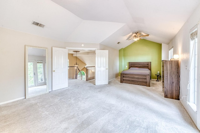 8164 N 8th St, Fresno, CA 93720 - unfurnished bedroom featuring carpet, baseboards, ceiling fan, visible vents, and vaulted ceiling