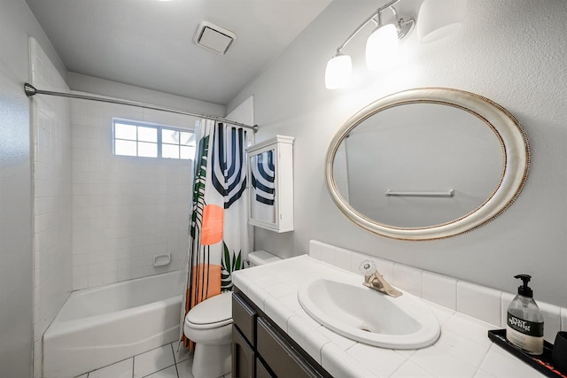 8164 N 8th St, Fresno, CA 93720 - full bath with toilet, shower / bath combo with shower curtain, vanity, and tile patterned flooring
