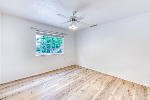 8164 N 8th St, Fresno, CA 93720 - unfurnished room featuring a ceiling fan, baseboards, visible vents, and wood finished floors