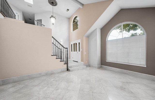 8164 N 8th St, Fresno, CA 93720 - entryway featuring high vaulted ceiling, stairs, beamed ceiling, and baseboards