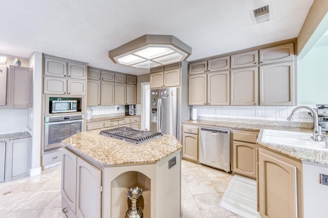 8164 N 8th St, Fresno, CA 93720 - kitchen with appliances with stainless steel finishes, visible vents, light tile patterned flooring, and a sink