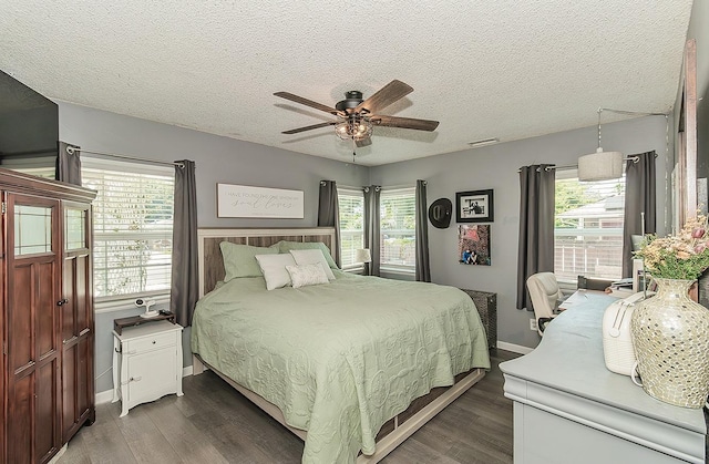 528 W Yale Ave, Fresno, CA 93705 - bedroom featuring a textured ceiling, baseboards, and wood finished floors