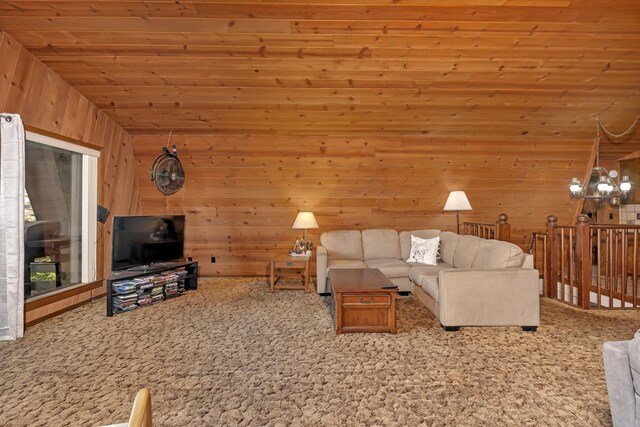 39090 Woodland Rd, Shaver Lake, CA 93664 - living area featuring carpet flooring, wood walls, wood ceiling, a chandelier, and vaulted ceiling