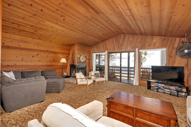 39090 Woodland Rd, Shaver Lake, CA 93664 - carpeted living area with wooden walls, healthy amount of natural light, vaulted ceiling, and wooden ceiling