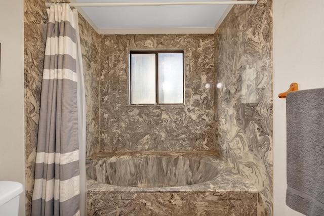 39090 Woodland Rd, Shaver Lake, CA 93664 - full bath featuring a tub with marble appearance, toilet, a shower with shower curtain, and ornamental molding