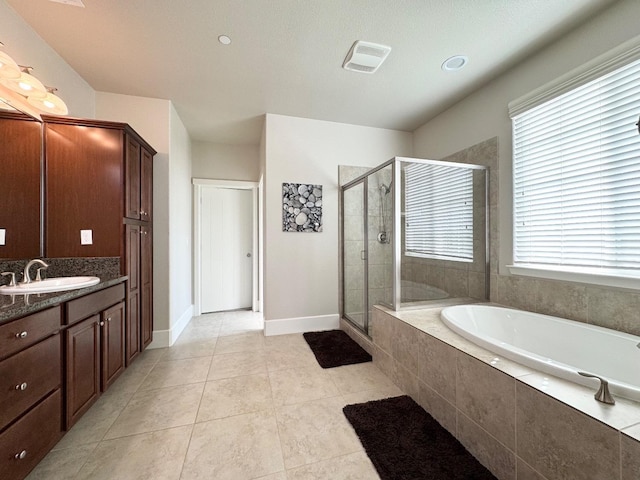 1885 N Whitehorse, Clovis, CA 93619 - full bathroom with a garden tub, visible vents, tile patterned flooring, a shower stall, and vanity