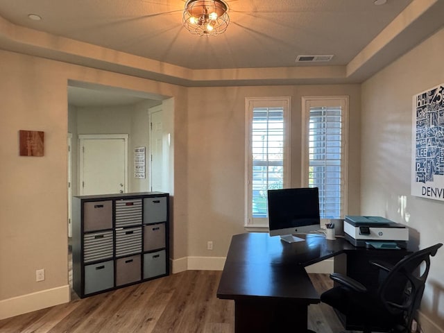 1885 N Whitehorse, Clovis, CA 93619 - office with baseboards, visible vents, and wood finished floors
