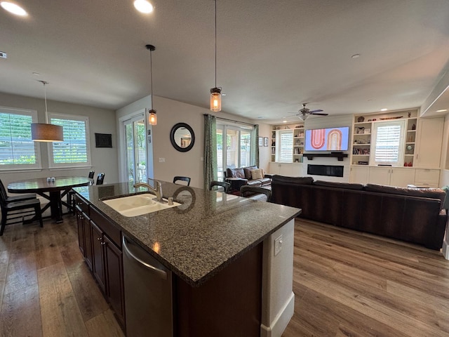 1885 N Whitehorse, Clovis, CA 93619 - kitchen with hanging light fixtures, dark wood finished floors, stainless steel dishwasher, and a sink