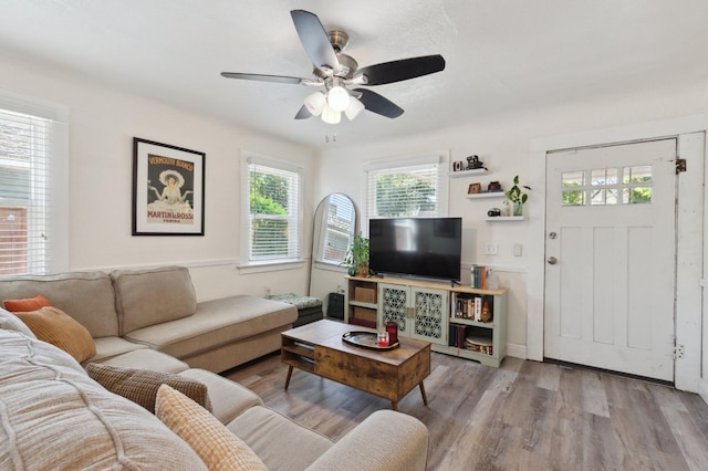 1568 N Glenn Ave, Fresno, CA 93728 - living room with a ceiling fan and wood finished floors