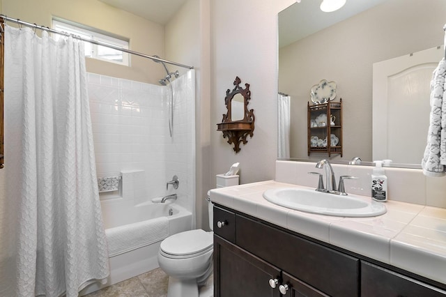 3415 Bellaire Ave, Clovis, CA 93619 - full bath featuring toilet, vanity, shower / tub combo with curtain, and tile patterned flooring