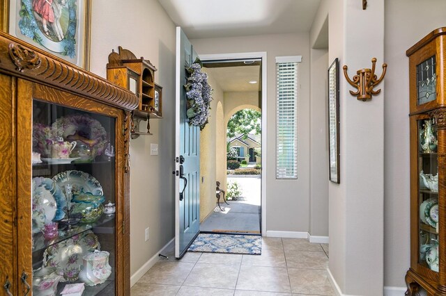 3415 Bellaire Ave, Clovis, CA 93619 - entrance foyer featuring baseboards and light tile patterned floors