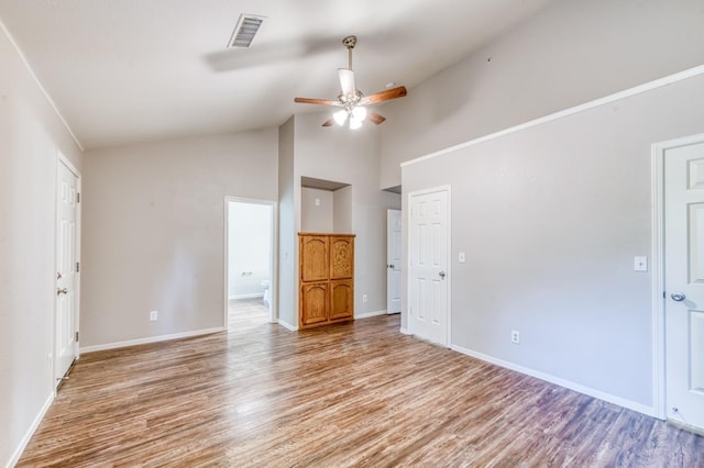 944 N Chapel Hill Ave, Clovis, CA 93611 - interior space featuring high vaulted ceiling, visible vents, ceiling fan, baseboards, and light wood-style floors
