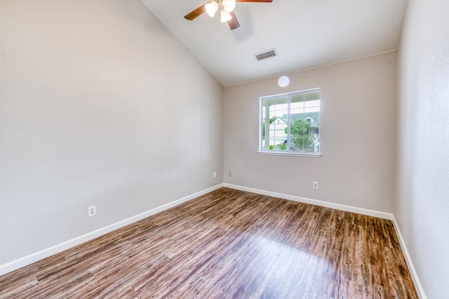 944 N Chapel Hill Ave, Clovis, CA 93611 - unfurnished room featuring baseboards, visible vents, wood finished floors, and lofted ceiling