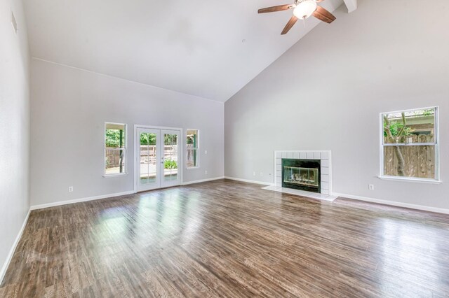 944 N Chapel Hill Ave, Clovis, CA 93611 - unfurnished living room with a ceiling fan, a fireplace, high vaulted ceiling, and wood finished floors