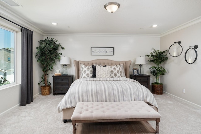 carpeted bedroom with ornamental molding, baseboards, visible vents, and recessed lighting