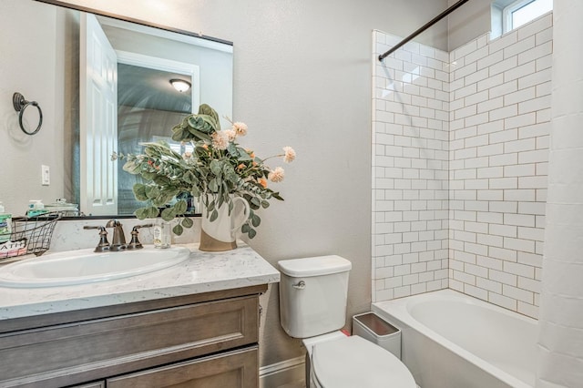 full bath with toilet, vanity, and shower / bath combination