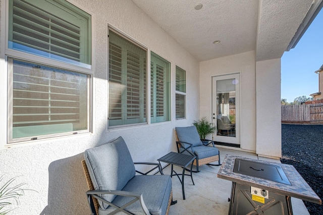 view of patio featuring fence