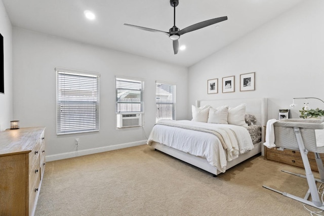 bedroom with cooling unit, baseboards, ceiling fan, light colored carpet, and lofted ceiling