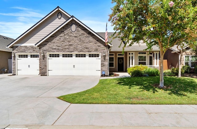 view of front facade featuring concrete driveway, a front yard, a garage, and stone siding