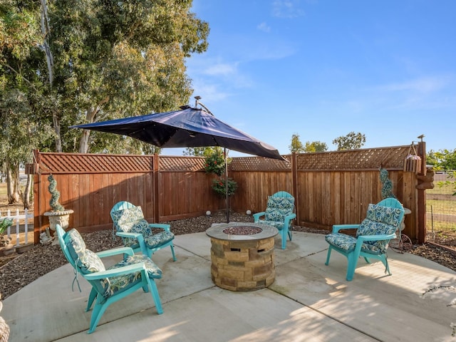 17324 Bonita Rd, Madera, CA 93636 - view of patio / terrace with a fenced backyard and a fire pit