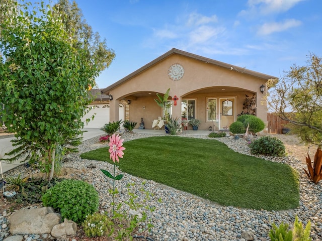 17324 Bonita Rd, Madera, CA 93636 - view of front facade featuring fence, concrete driveway, a garage, stucco siding, and a front yard