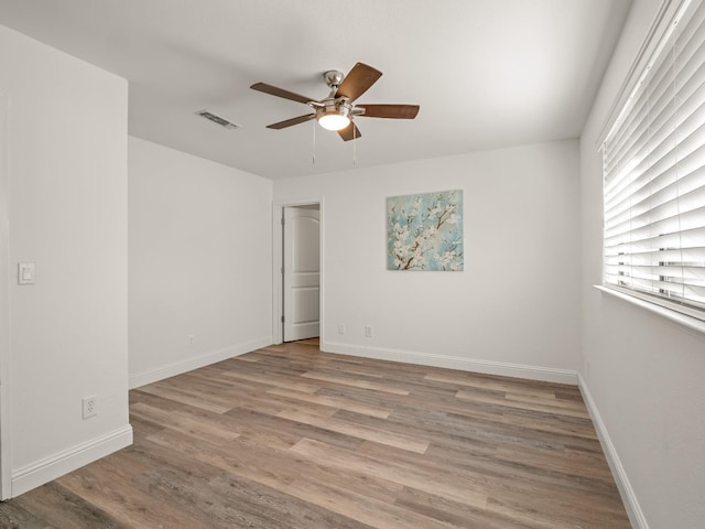 17324 Bonita Rd, Madera, CA 93636 - unfurnished bedroom featuring ceiling fan, light wood-style flooring, baseboards, and visible vents