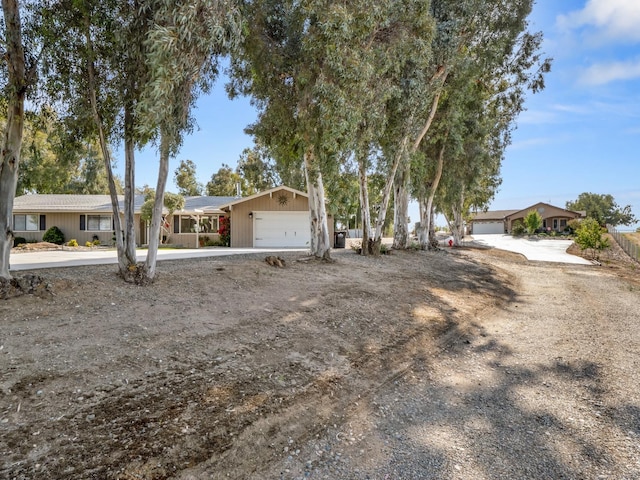 17324 Bonita Rd, Madera, CA 93636 - ranch-style house featuring concrete driveway and an attached garage