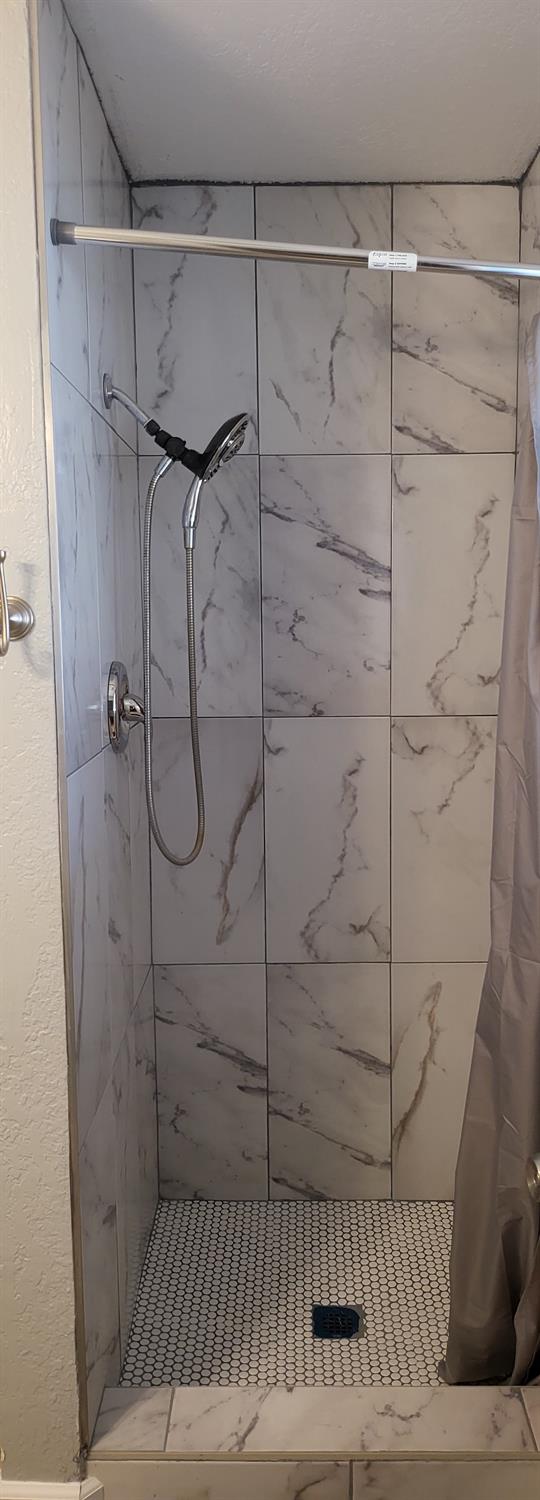 full bath with a stall shower