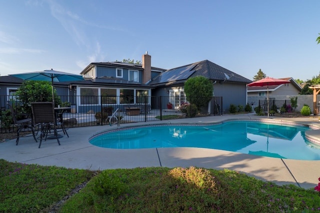 1233 Redwood Ln, Selma, CA 93662 - view of pool with a patio
