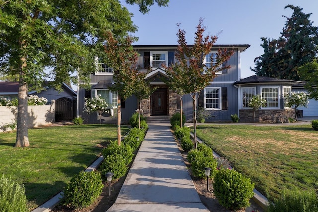 1233 Redwood Ln, Selma, CA 93662 - view of front of property featuring stone siding and a gate