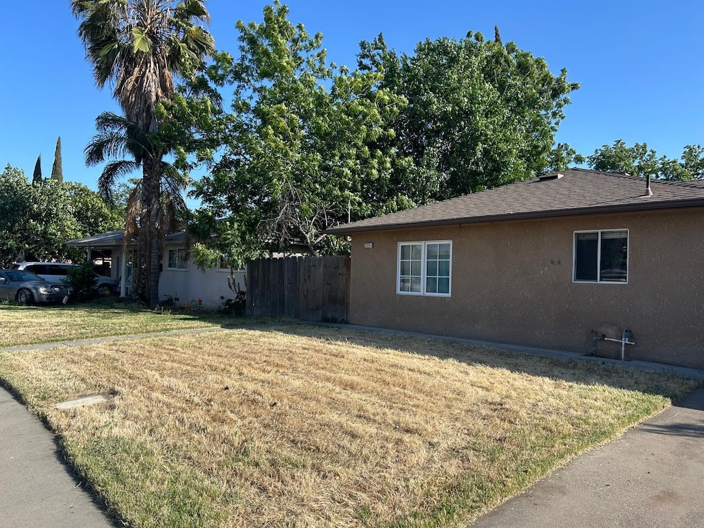 3204 E E Ter, Fresno, CA 93703 - view of property exterior with stucco siding
